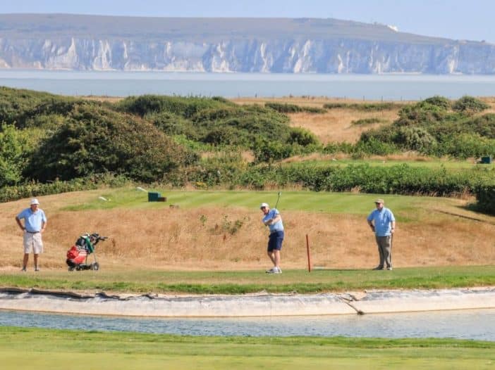 Oakhaven Golfers at Barton on Sea Golf Club with Isle of Wight and Needles in the background